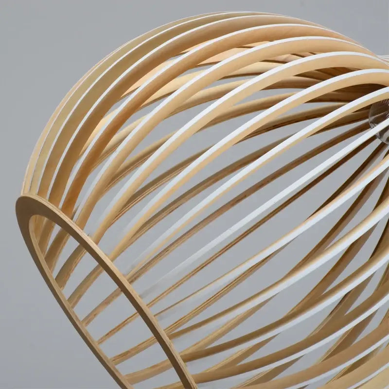 Wooden lampshade with a wavy design on a gray background